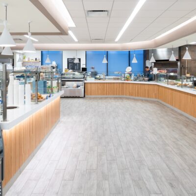 A hotel's food service area remodeled by custom commercial millworkers from Seven Trees Woodworking