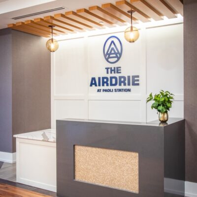 The Airdrie at Paoli Station lobby, remodeled by custom commercial millworkers from Seven Trees Woodworking