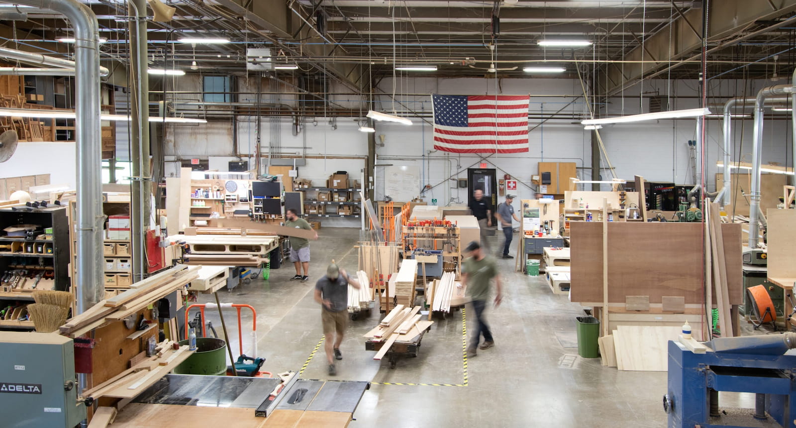 A wide shot of the Seven Trees Woodworking warehouse